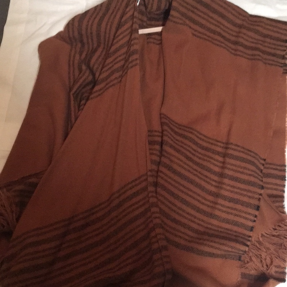 Never worn red poncho